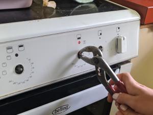 I was at a friend's rental house for a Christmas event. As we chatted in the kitchen, I noticed that the oven had lost its dials, so that my friend was reduced to using a set of pliers (shown) to use the oven. I'm not sure if they had asked for repairs and not got them, or just decided it wasn't even worth trying. 