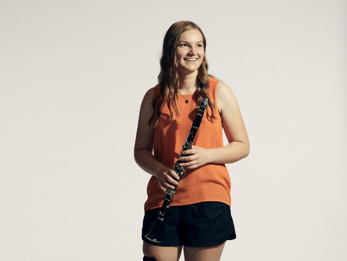 Student holding clarinet