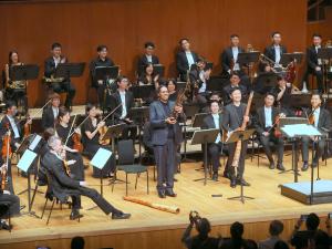 Dylan Crismani's 'Coming Together' for Didgeridoo, Sheng and Orchestra at Hong Kong City Hall, with Luke Dollman (conductor), William Barton (didgeridoo), Loo Sze-wang (Sheng) and the Hong Kong Sinfonietta. Photo: © HK Sinfonietta Ltd