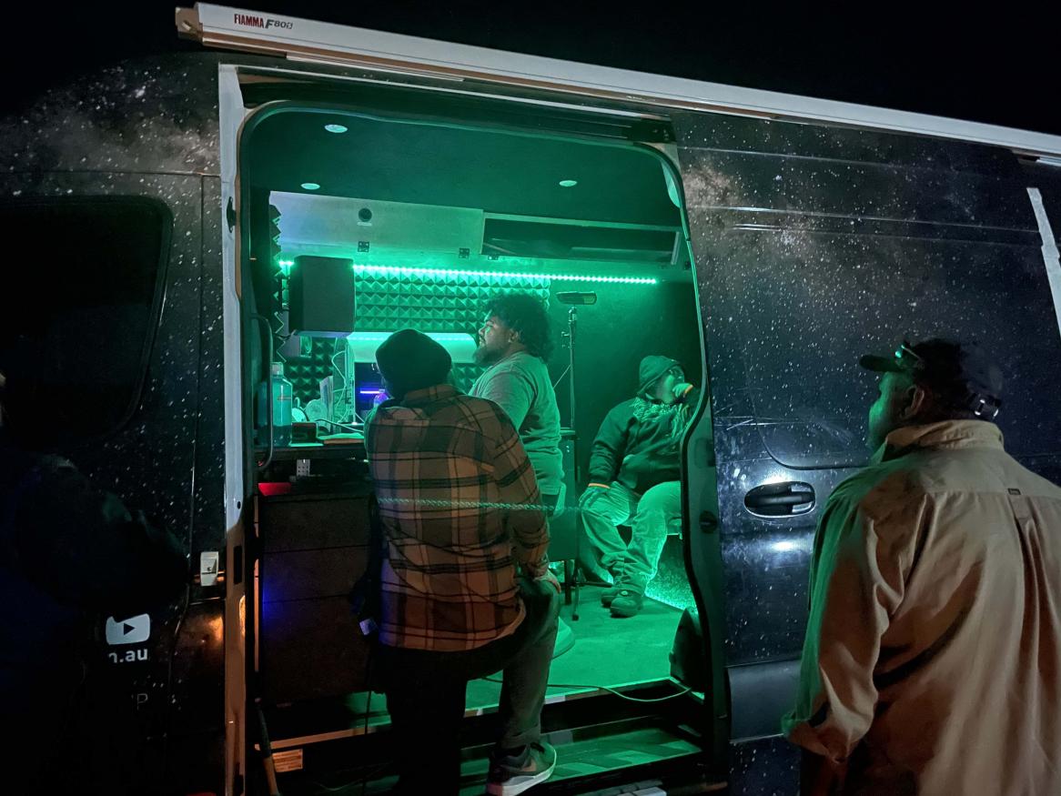 Elisha Umuhuri at the desk in Carclew's Gig Rig recording Warrukathi (Emu)