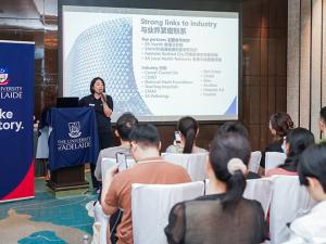 staff member addressing audience