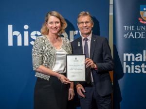 Professor Susan James Relly receives her University Award from Vice Chancellor Professor Peter Høj