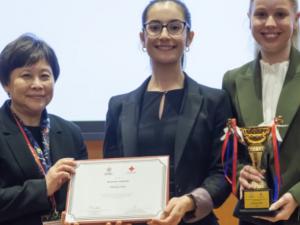Annalise Delic and Maddie McNeil holding their awards for the Red Cross International Humanitarian Law Moot competition 