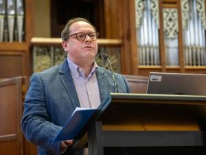 Associate Professor Mathew White announces the International Awards