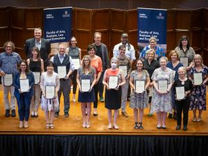 Faculty of ABLE Awards for Outstanding Achievement 2023 winners on Elder Hall stage