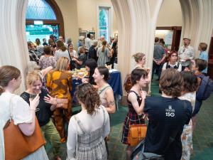 The Art of Curation crowd networking over drinks and nibbles in Elder Hall