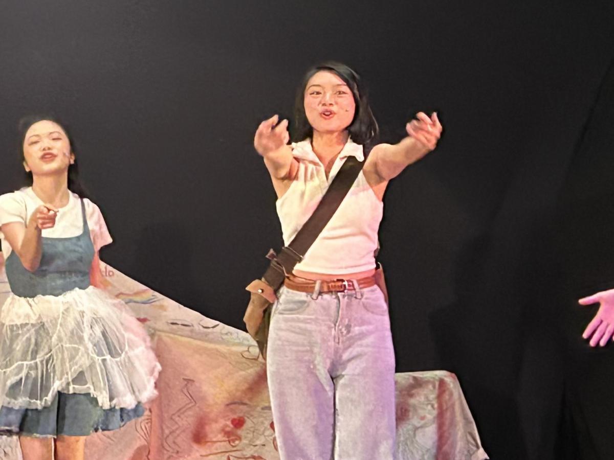 Students performing in Journey to Little Happiness