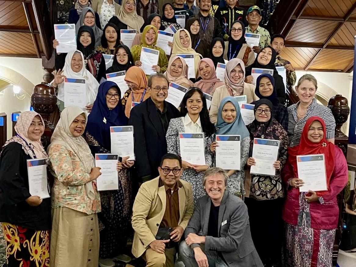 Members from the School of Education and visitors from East Kalimantan, Indonesia pose together