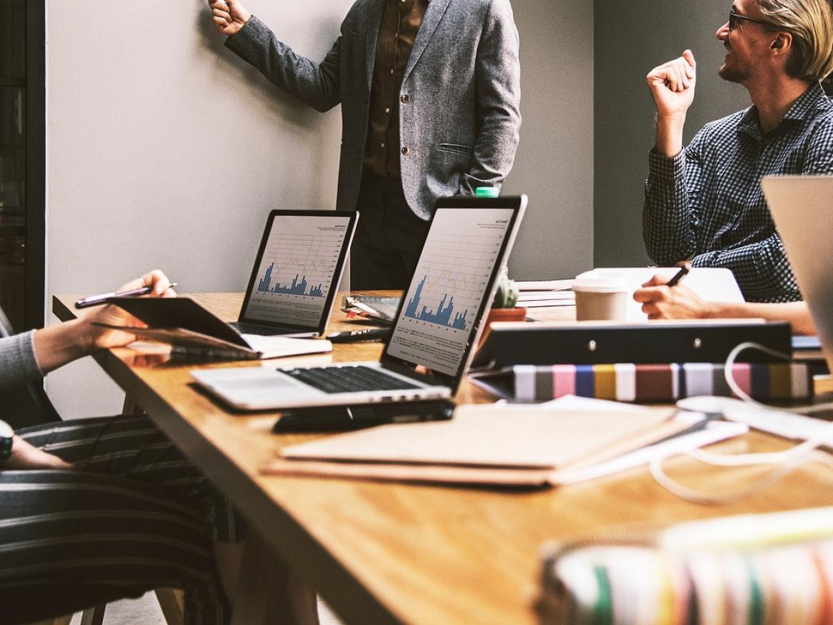 A group of workers in a business meeting
