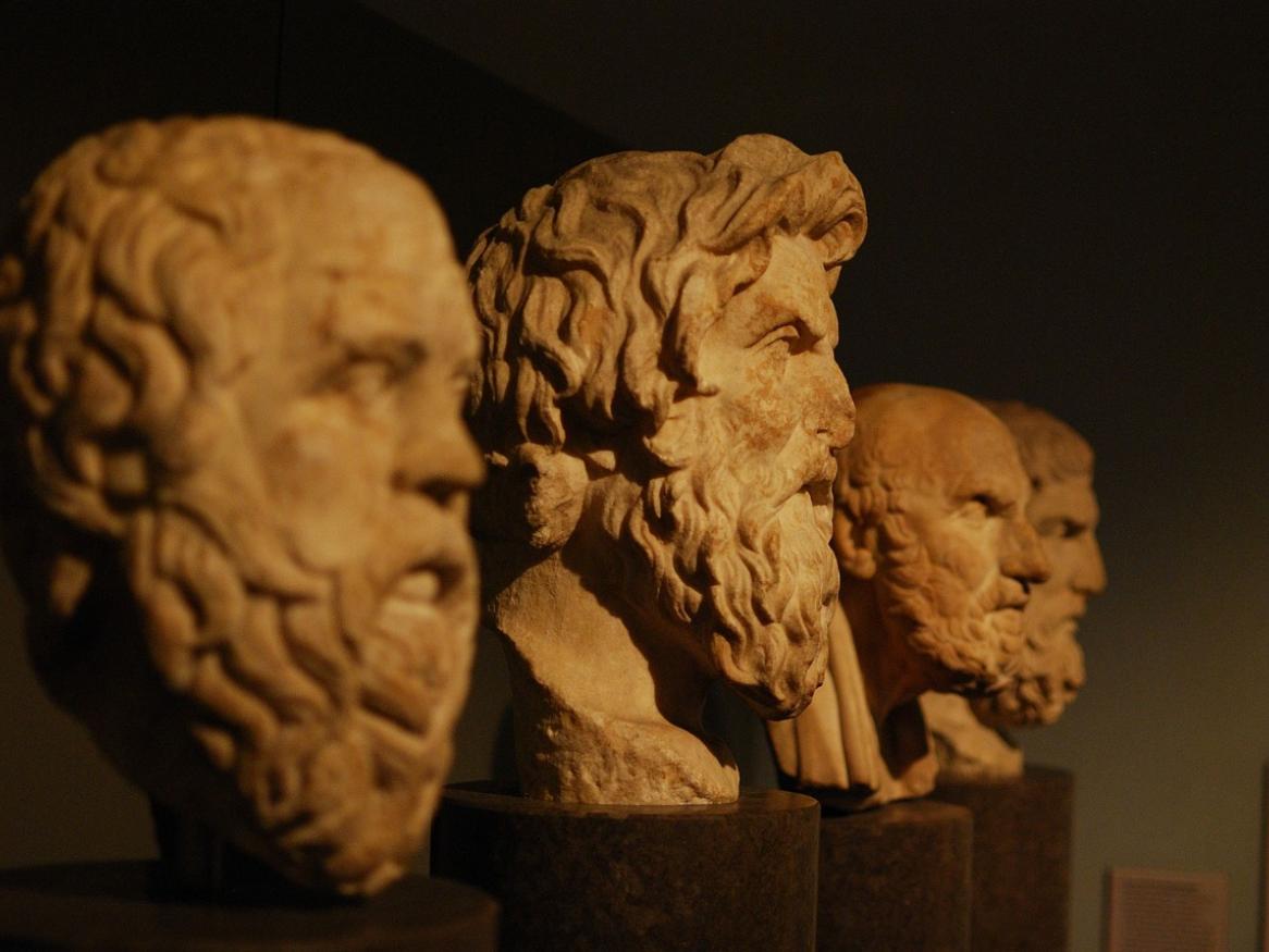 A row of philosophers' bust statues