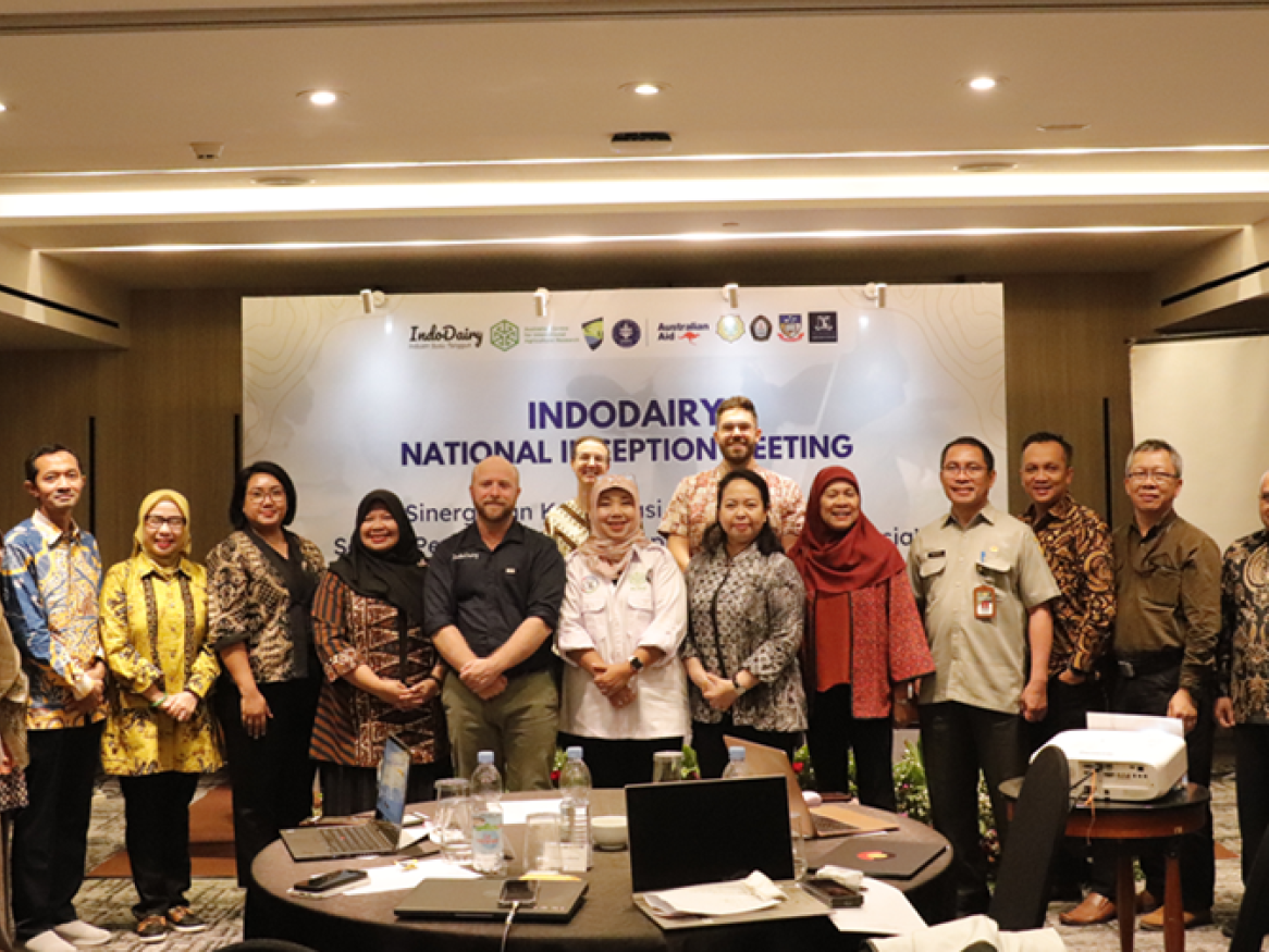 A group of people attend a School of Economics and Public Policy International meeting