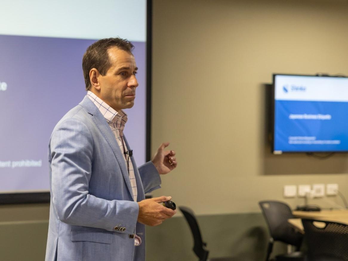 Dr Paul Smith, Director of Shinka Management, delivers a guest lecture